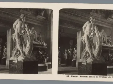 Milo of Croton marble sculpture at the Louvre, shown in dramatic struggle with a lion.