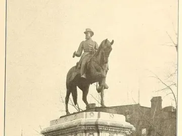 Major General James B. McPherson Memorial, an equestrian statue on a tall stone pedestal in a park setting