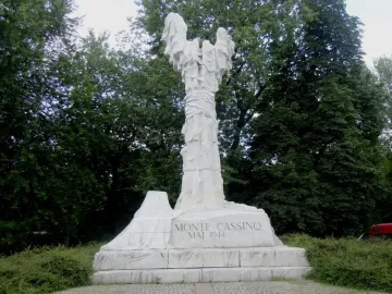 Monument to the Battle of Monte Cassino, a tall white sculptural figure on a column with the inscription \