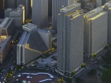 Vaillancourt Fountain in a plaza, seen from above among streets and tall buildings.