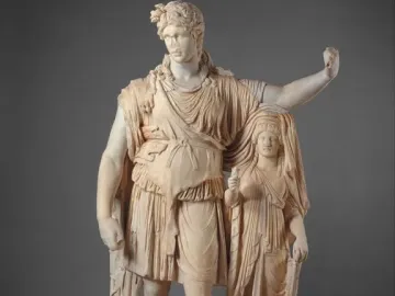 Hope Dionysus marble statue of a male figure leaning beside a draped female figure on a rocky support.