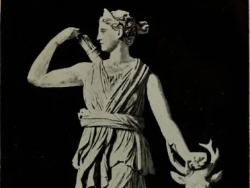 Diana of Versailles, a classical statue of a draped female figure reaching for an arrow with a small deer beside her.