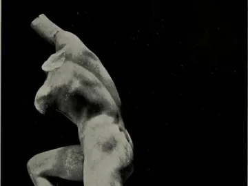 Incomplete Subiaco Ephebe sculpture of a kneeling male figure with broken arms on a rectangular base.