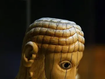 Carrizo Christ sculpture showing a carved head with wavy hair and a full beard.