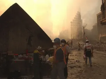 Cloud Fortress stands at the left amid rubble, with recovery workers in hard hats and reflective vests in the foreground.