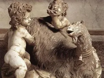 The Goat Amalthea marble sculpture showing a shaggy goat with two small child-like figures beside it.