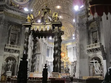 St. Peter\'s Baldachin beneath the grand dome of St. Peter\'s Basilica