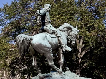 General Philip Sheridan Memorial, a bronze equestrian statue of a uniformed man with his arm outstretched on a stone pedestal.