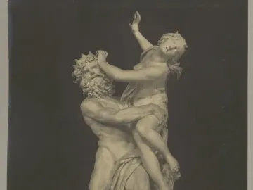 Marble sculpture of Pluto abducting Proserpina, with a multi-headed dog at the base.
