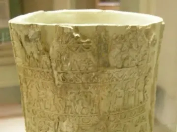 The Situla of the Pania, a pale cylindrical vessel with bands of relief carvings and visible wear.