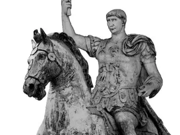 Trajan\'s equestrian statue showing an armored rider on a horse with one foreleg raised, holding an object aloft.