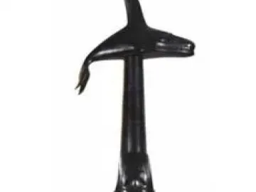 Spirit of Haida Gwaii sculpture with a stylized killer whale atop a carved column of abstract figures.