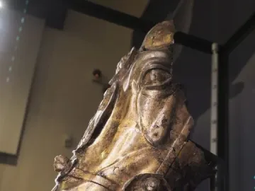 Waldgirmes horse head bronze sculpture with an open mouth and a medallion on the bridle