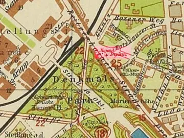 A section of an aged Leipzig map marking the Youth Monument with the German label \'Jugend Denkmal\' and a red cross in a park area.