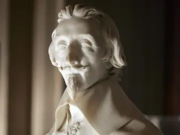 Marble bust of Cardinal Richelieu with wavy hair, mustache, and pointed goatee.