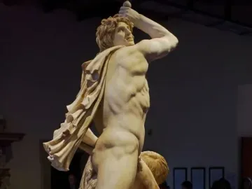 Ludovisi Gaul marble sculpture of a muscular figure holding a dagger aloft, with a fallen figure below.