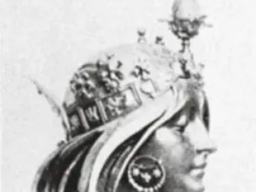 Grayscale sculptural bust of a woman in profile, wearing an ornate crown with a flame-like finial and flowing hair.