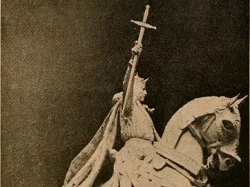 Apotheosis of St. Louis, a bronze equestrian statue of a crowned figure on a rearing horse against a blue sky