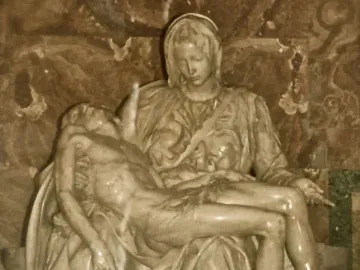 Michelangelo\'s Pietà, a marble sculpture of the Virgin Mary holding the body of Jesus across her lap.