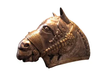 Sassanian horse head sculpture with ornate metal detailing, shown in profile facing left.
