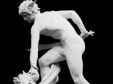 Perseus and the Gorgon marble sculpture showing Perseus poised to strike Medusa, who lies prone with snakes in her hair and a sword raised.