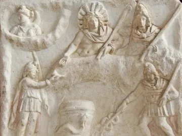 Mithras of Fiano Romano relief showing Sol and another figure above a central altar with a serpent, flanked by attendants.