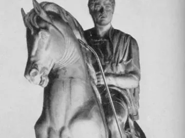 Prince Józef Poniatowski Monument, a bronze equestrian statue of a cloaked rider on a rearing horse atop a tall pedestal.
