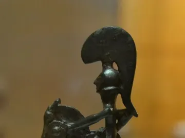 Warrior of Moixent bronze figurine of a rider on horseback with a crested helmet and round shield