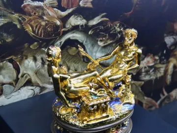 Cellini Salt Cellar with gilded reclining male and female figures on an ornate enamelled base