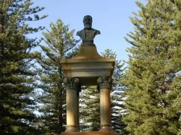 Maitland Brown Memorial stone monument with plaques, a canopy on columns, and a bronze bust on top.