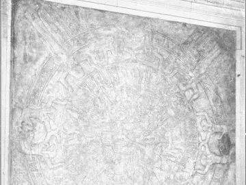 The Dendera Zodiac stone relief with a circular central carving surrounded by figures and symbols.