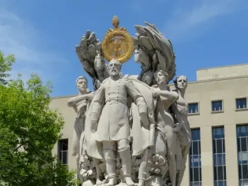 George Gordon Meade Memorial with a central military figure, allegorical statues, and a golden eagle medallion above the inscription MEADE.