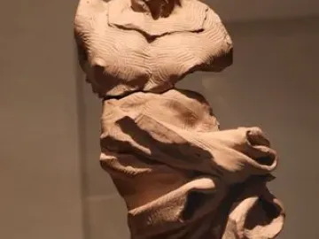 Terracotta bozzetto for Bernini’s San Longino statue, with deep drapery folds and textured surface.