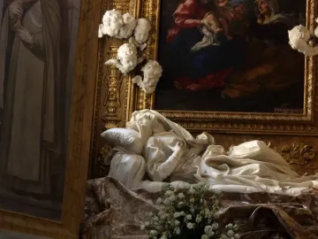 Ecstasy of Blessed Ludovica Albertoni, a white marble sculpture of a reclining woman with her head tilted back and hands crossed on her chest.