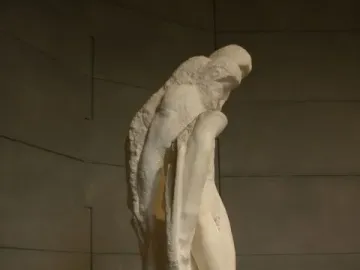Rondanini Pietà, a tall unfinished white marble sculpture with elongated intertwined figures on a stone pedestal.