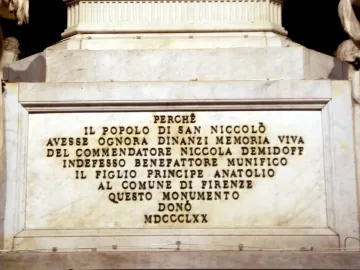 Inscribed marble plaque on the Monument to Nicola Demidoff with dark carved lettering and the year MDCCCLXX.