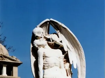 The Kiss of Death marble sculpture showing a winged skeleton kissing a kneeling man.