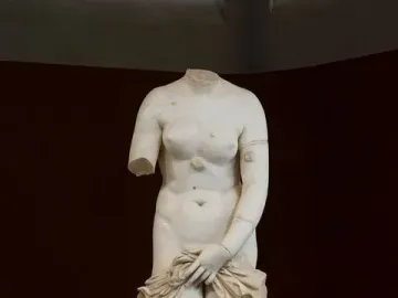 Venus Landolina, a headless marble female statue with one arm missing and drapery covering the lower body.