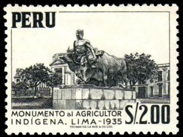 The monument La yunta shows a male figure standing beside two yoked oxen on a tall pedestal.