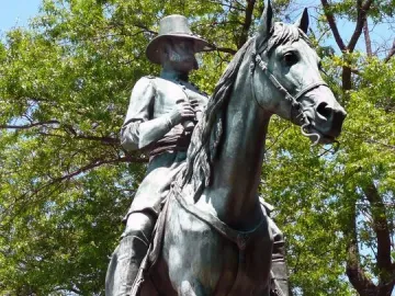 Ambrose Burnside equestrian monument showing a bronze man in uniform riding a horse.