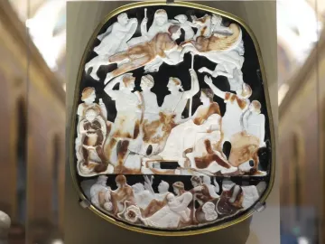 Great Cameo of France in a gold frame, showing carved classical figures arranged in three horizontal levels.