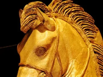 Close-up of the Winged Horses of Tarquinia showing a horse head with ornate bridle and detailed mane.