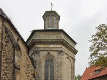 Mausoleum of Prince Ernst in Stadthagen, a stone monument with arched windows and a domed cupola topped by a cross.