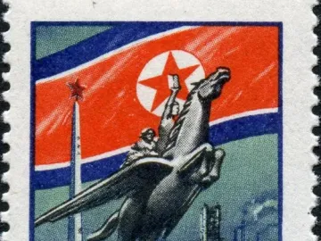 Postage stamp depicting the Chollima Statue with a winged horse carrying a worker and farmer, with industrial imagery and Cyrillic text.