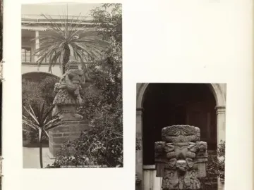 Coatlicue stone statue with a skirt of serpents, skull and heart motifs on the torso, and twin serpent heads at the top.