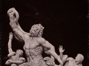 Laocoön and His Sons sculpture showing three male figures struggling against coiling snakes.