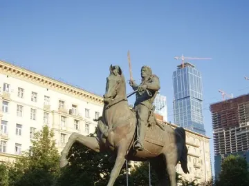 Pyotr Bagration monument showing a bronze equestrian statue on a multi-tiered granite pedestal in a paved plaza.