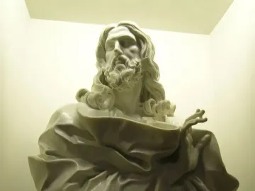 Bust of the Saviour, a white marble bust of a bearded man with long wavy hair and draped robes, gazing upward.