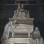 Tomb of Pope Clement XIV by Antonio Canova, showing a seated pope above two draped female figures and a sarcophagus