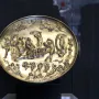 The Parabiago Plate, a gold-toned circular relief with a central chariot scene and surrounding mythological figures.